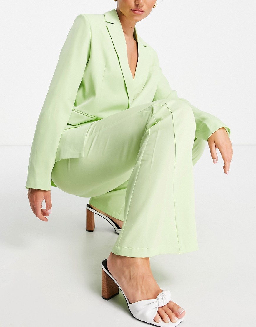 high waist flare pants in lime green