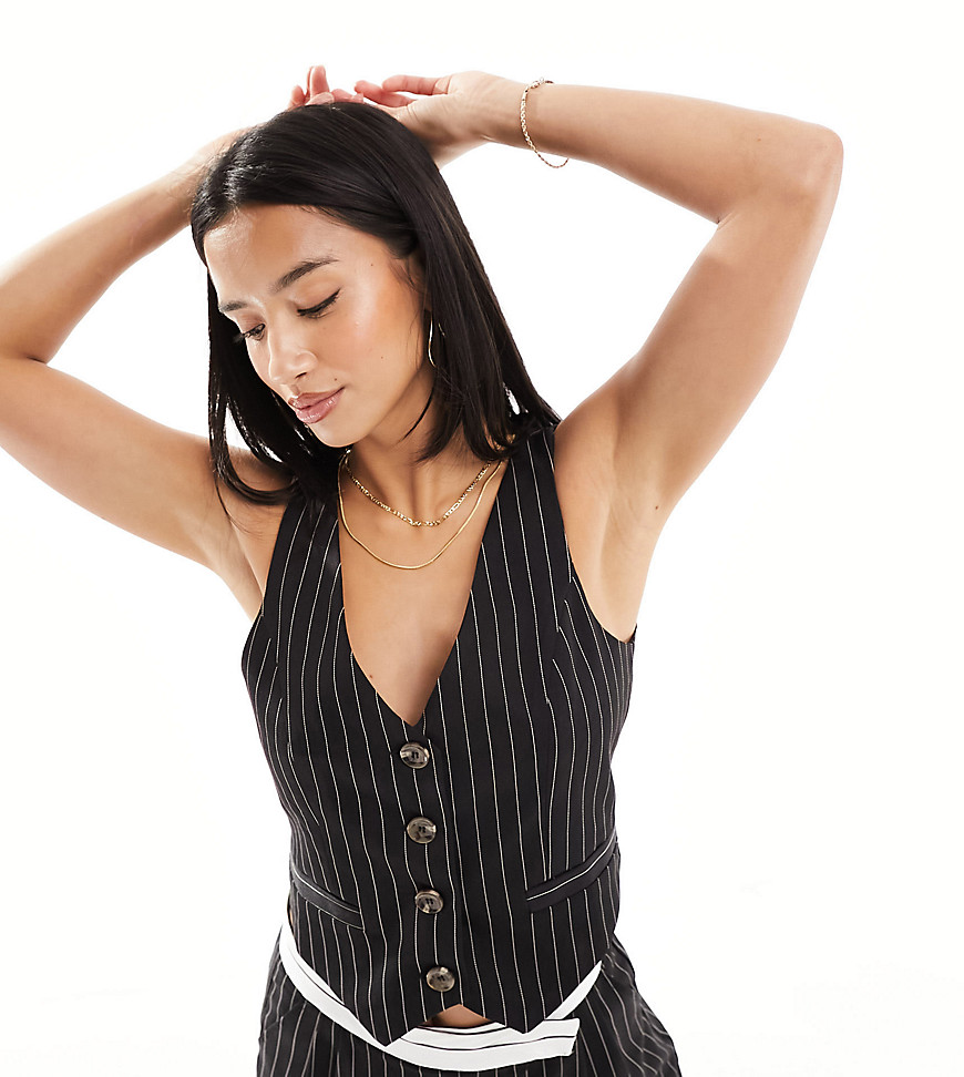 fitted pinstripe vest in black - part of a set