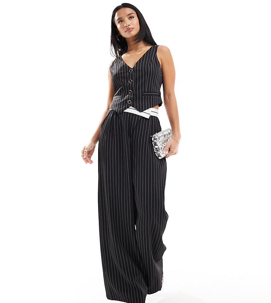 tailored pinstripe pants with asymmetric waistband in black - part of a set