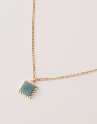 Faded Future Blue Resin Pendant Necklace In Gold