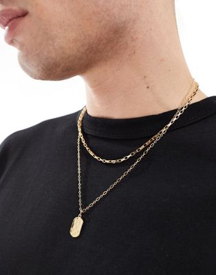 layered chain and tag pendant necklace in gold