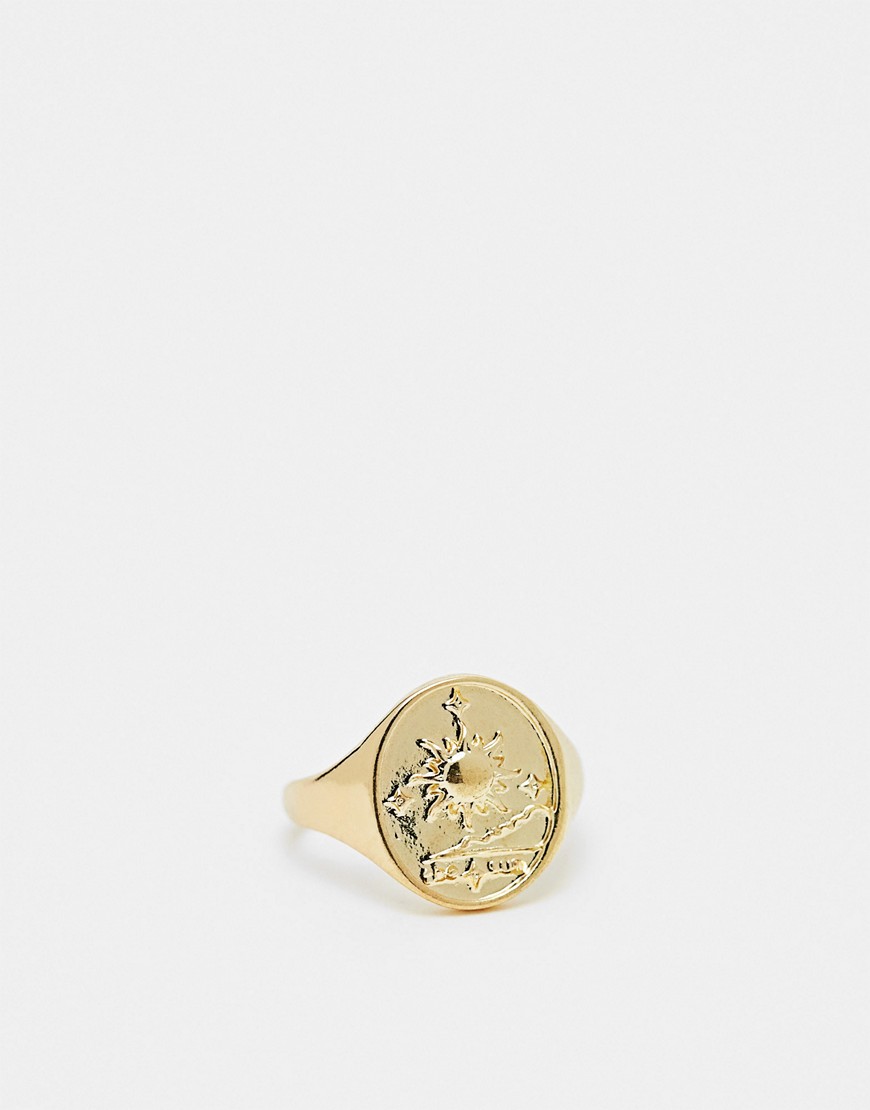 signet ring with engraved sun in gold