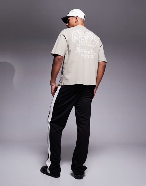 Faded Store – Czarne joggersy z szerokimi nogawkami i kontrastowymi lampasami, 2 z 5