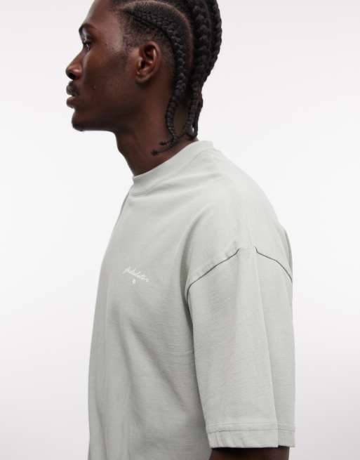 Faded Store – Matchagrön t-shirt med logga och konsttryck baktill i 100% bomull, 4 av 5