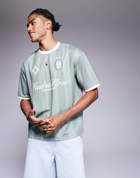 Faded Store script logo striker football jersey in green