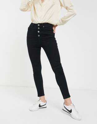 button fly black skinny jeans