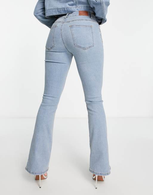 Fae high waist flared jeans with diamante fringe in washed blue