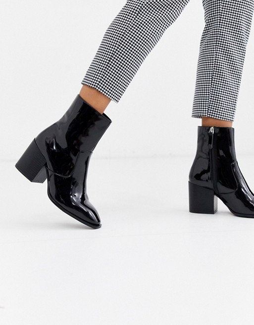 Faith Busted black patent mid heeled ankle boots
