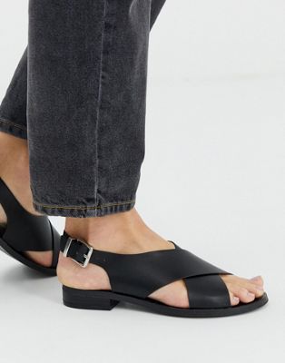 black cross sandals