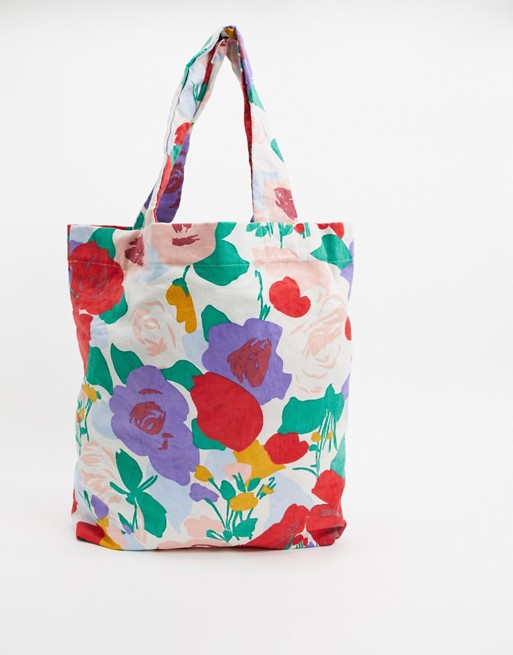 Faithfull floral corduroy travel tote bag in floral print