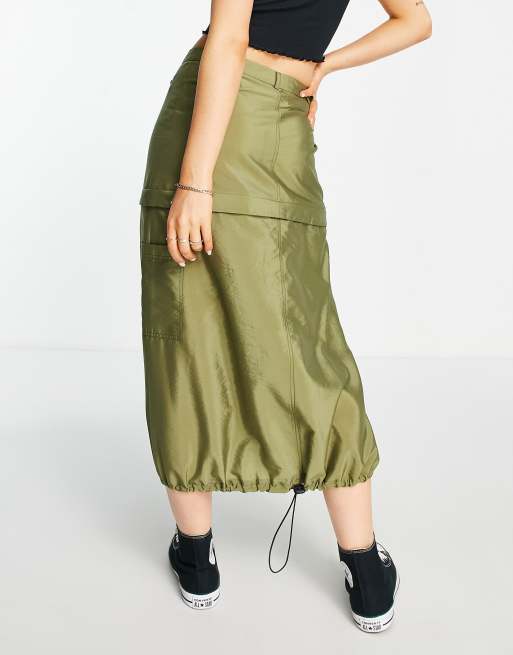 Falda 2 en 1 caqui cargo con largo regulable midi y corto por una cremallera | ASOS