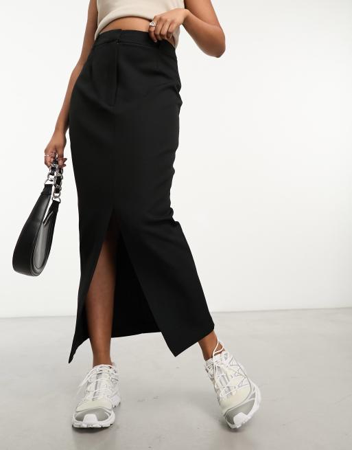 Falda de tubo negra con abertura delantera de River Island, 3 de 4