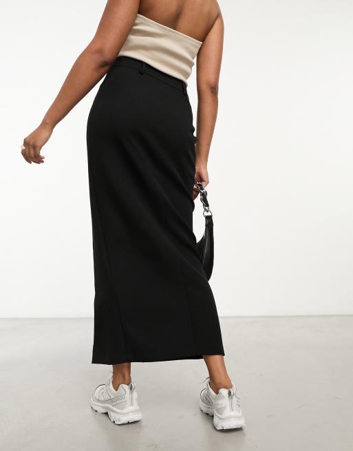 Falda de tubo negra con abertura delantera de River Island, 4 de 4