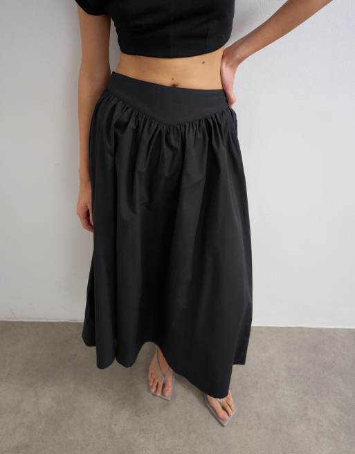 Falda larga negra amplia con cintura baja de Topshop, 2 de 5