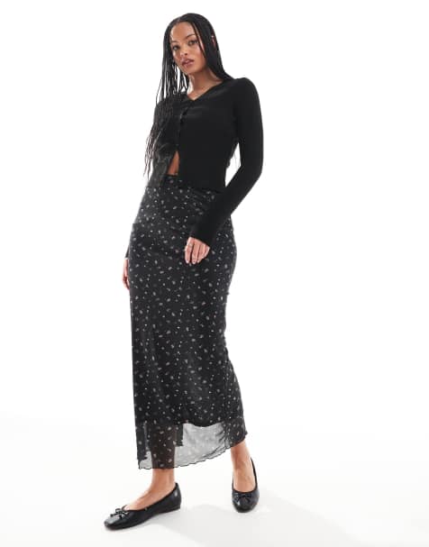 Falda larga negra con estampado de florecitas y bordes ondulados de ONLY Tall - view 1