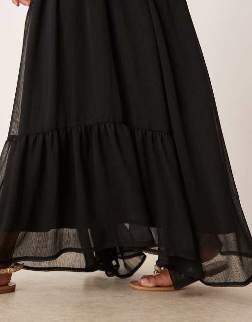 Falda larga negra de estilo boho de tejido suave vaporoso de ASOS DESIGN Petite, 4 de 5