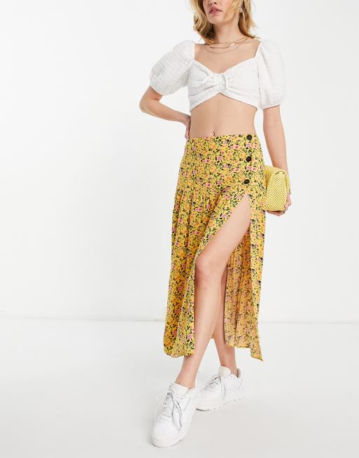 Falda midi amarilla con estampado de florecitas y botones laterales de ASOS DESIGN, 4 de 4