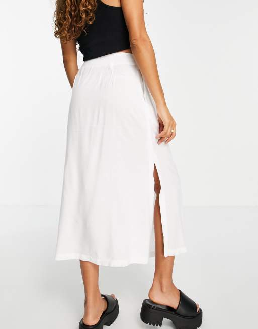 Falda midi blanca bolsillos profundos y botones de ASOS DESIGN ASOS