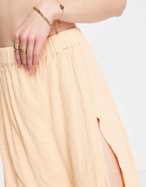 Falda midi color melocotón con abertura y acabado rugoso de ASOS DESIGN (parte de un conjunto), 3 de 4