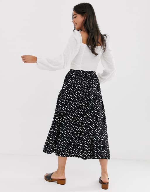 Falda midi con botones en la parte delantera, bolsillos y estampado monocromático de DESIGN | ASOS