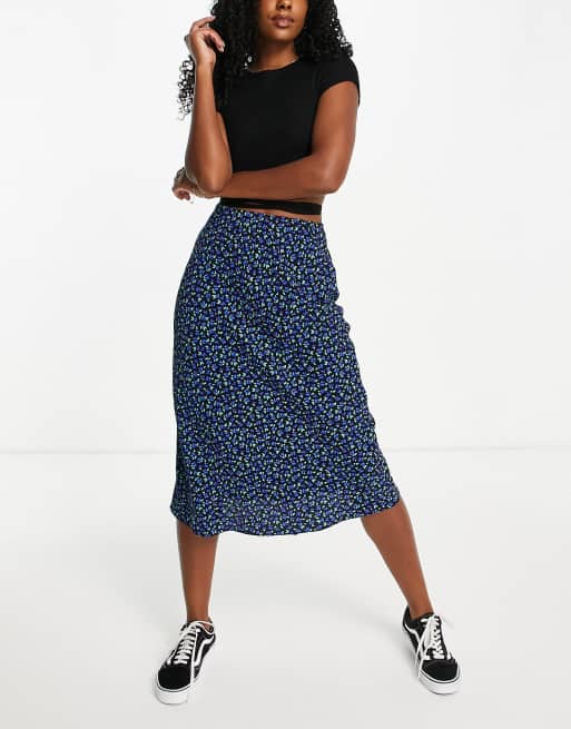 Falda midi con estampado de florecitas en tonos luminosos de corte al bies de Nobody's Child