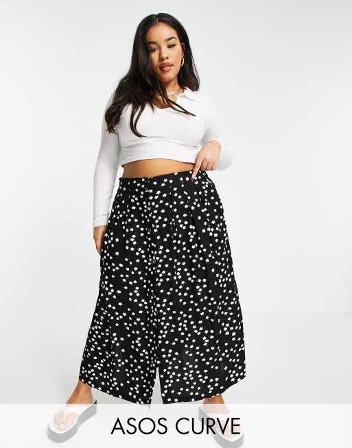 Falda midi negra con estampado de florecitas y botones de ASOS DESIGN Curve