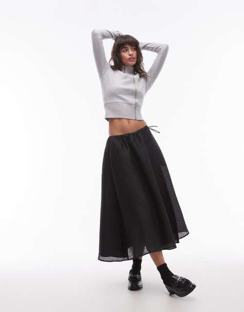 Falda midi negra de corte voluminoso con diseño brocado de ARKET - view 1