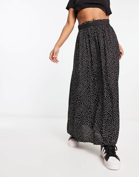Falda midi negra plisada con estampado de lunares de Only - view 1