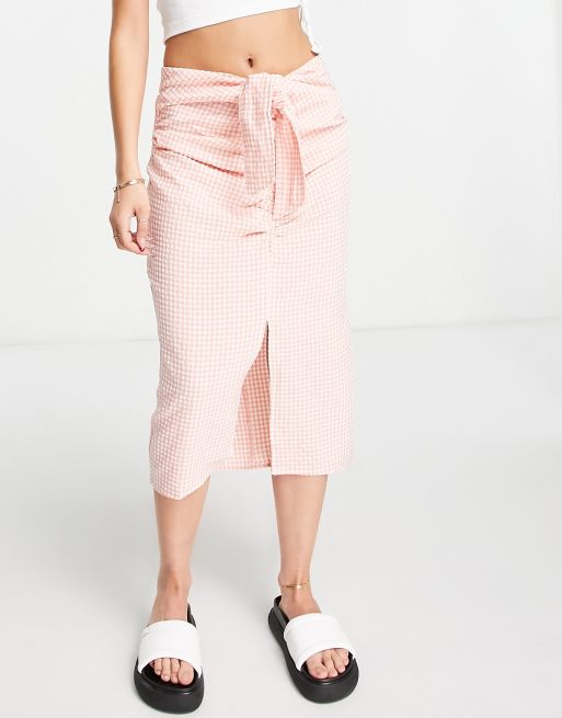 Falda midi rosa a cuadros vichy con detalle de lazada y abertura de Mango
