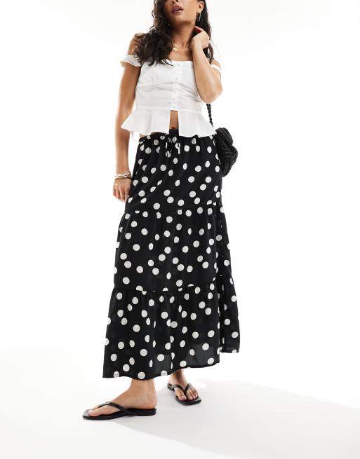 Falda semilarga negra escalonada con estampado de lunares blanco de Wednesday's Girl