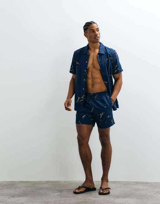 Farah Colbert co-ord arrow print logo swim shorts in navy, 4 of 5