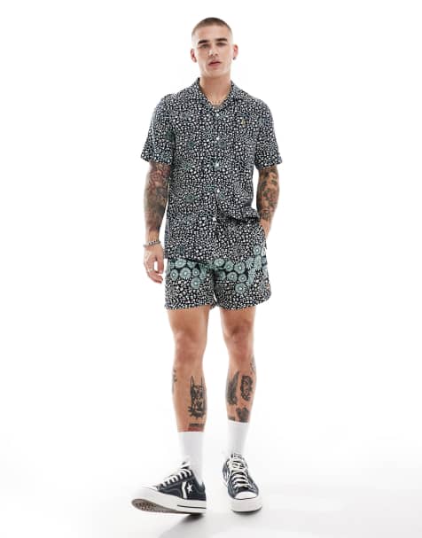 Farah colbert co-ord flower print swim shorts in navy - view 1
