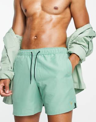 Farah Colbert swim shorts in pale green
