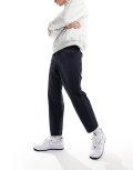 Farah Hawtin technical relaxed tapered pants in navy