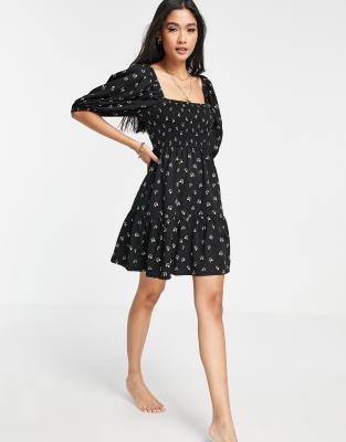Fashion Union Exclusive balloon sleeve sherried mini beach dress in black base floral print - ASOS Price Checker