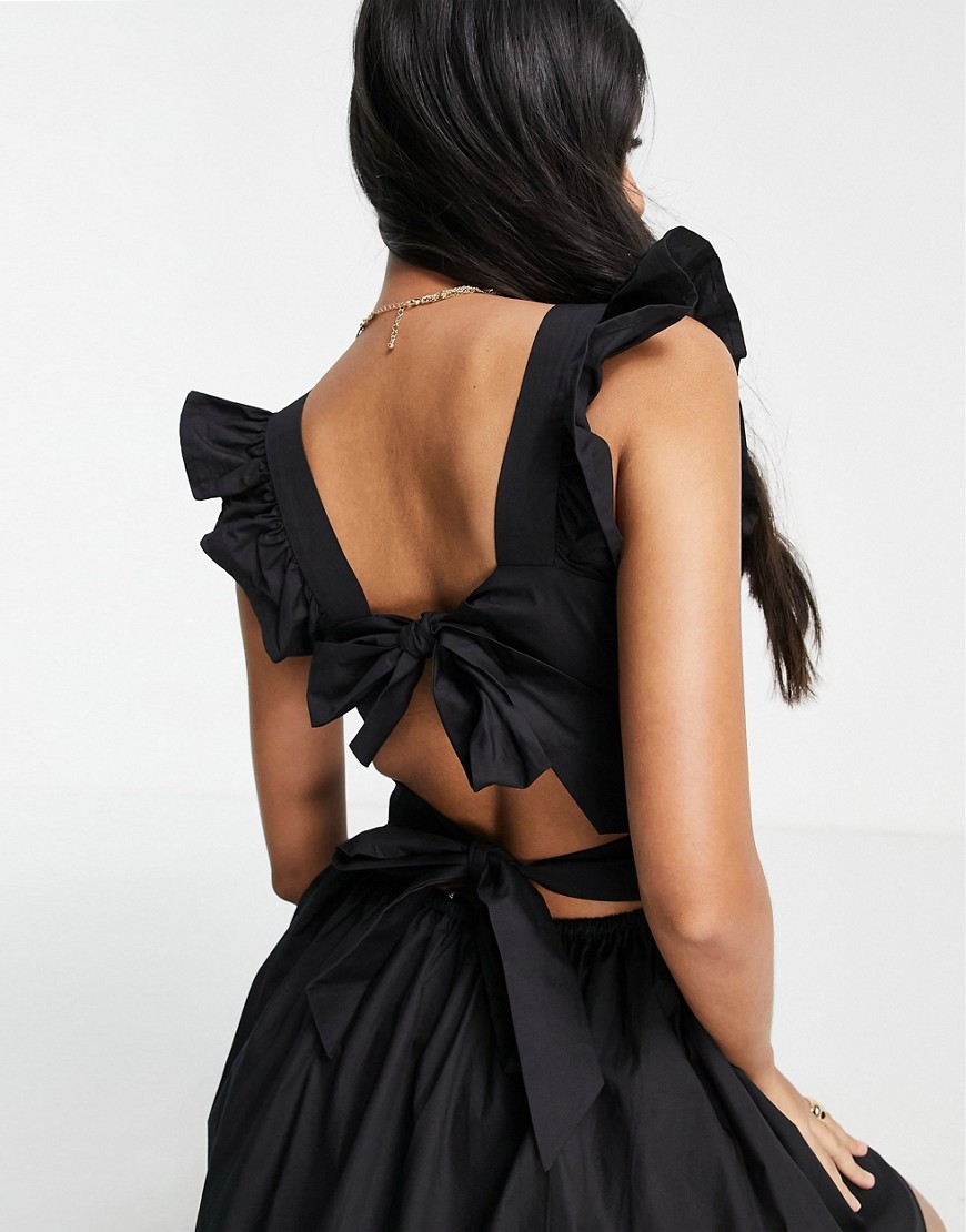 Alternative product photo of Fashion union exclusive cut out beach dress with frill detail in black