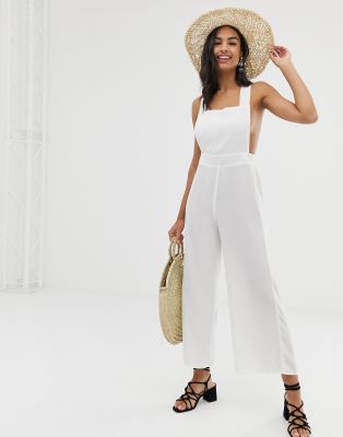 white jumpsuit beach