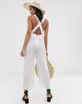 white jumpsuit beach