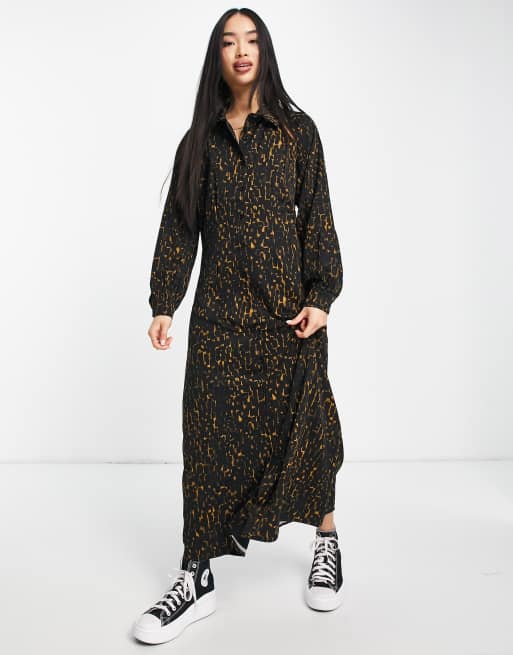 Fashion Union - Lange jurk met open achterkant, uitsnijdingen en bijna dierenprint in zwart
