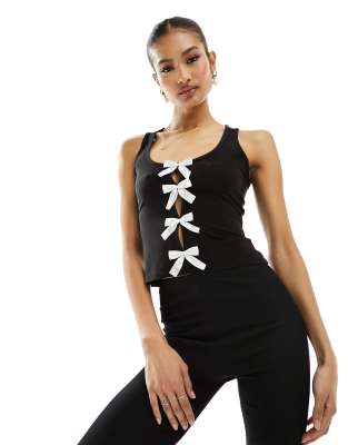 Fashionkilla Fashionkilla contrast bow detail vest top in black-Multi