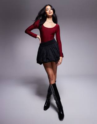 Fashionkilla Fashionkilla exclusive sculpted slinky scoop neck long sleeve body in burgundy-Red