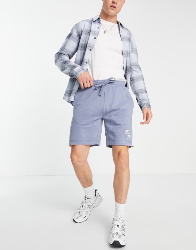 FCUK script logo shorts in light blue