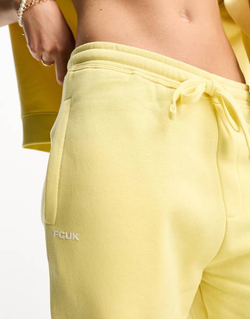 FCUK sweatpants with white logo in lemon - part of a set