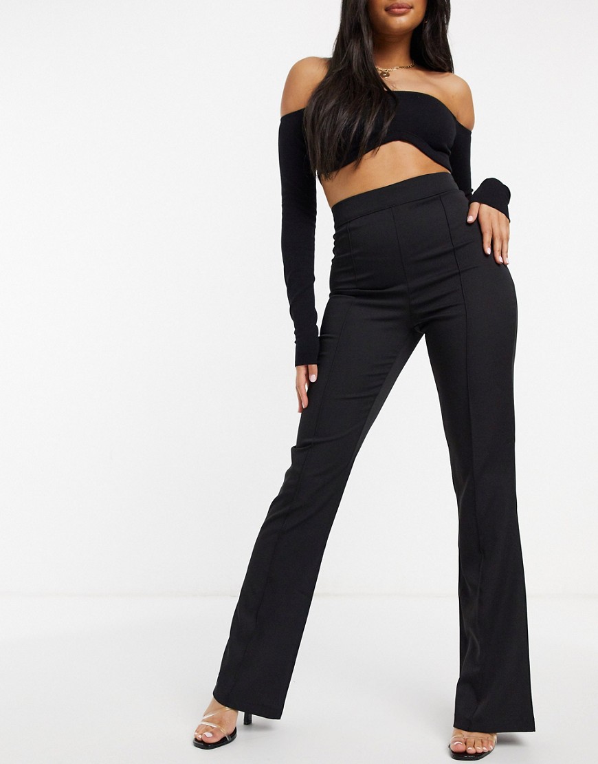 Femme Luxe - Flare-broek in zwart