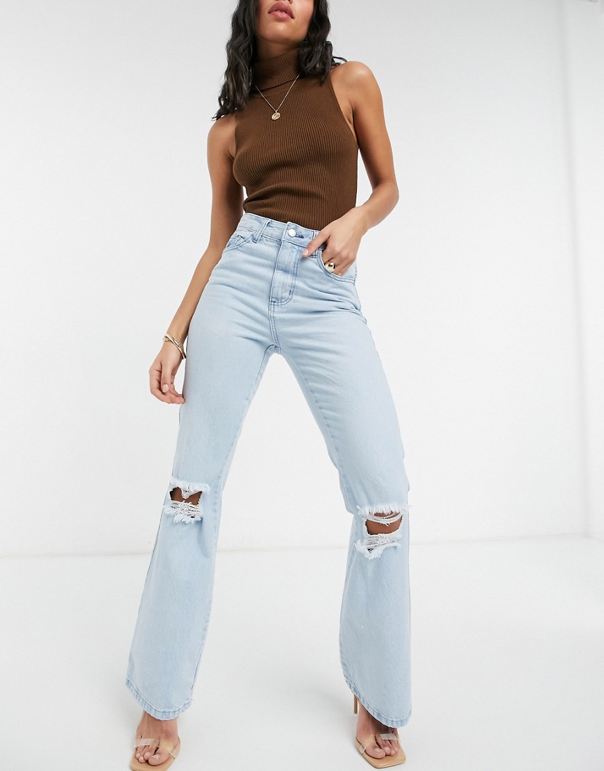 Femme Luxe high waist flares with ripped knees in light blue-Blues