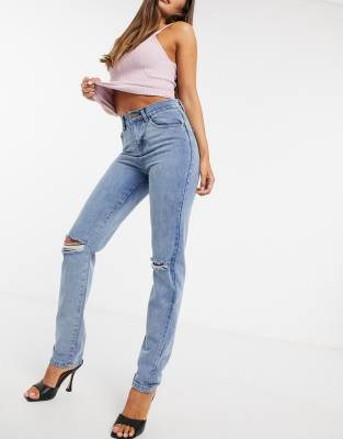 light blue ripped knee jeans