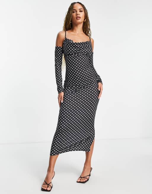 Femme Luxe - Midi-jurk met lange mouwen en smalle bandjes in zwart met witte stippenprint