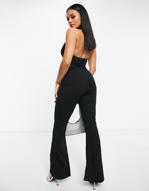 Femme Luxe – Svart jumpsuit i utsvängd design med utskurna detaljer, 4 av 4