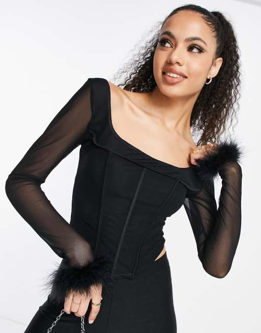 Femme Luxe - Top a corsetto con finiture in piuma sintetica color nero