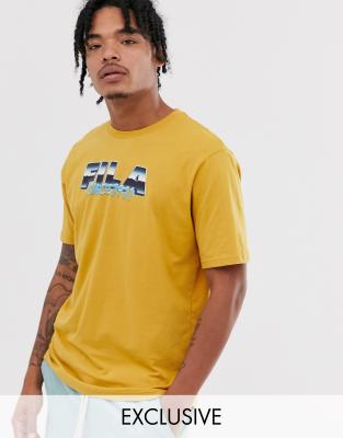 beige fila shirt